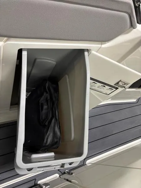 Slide: The Image of Storage compartment in 2025 Cobalt R31 boat, featuring a sleek design and practical utility. - 22