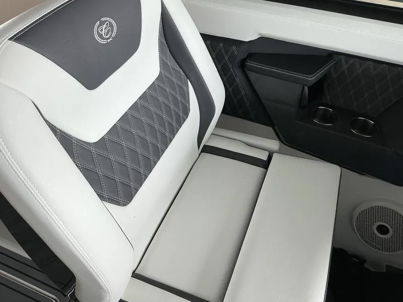 Slide: The Image of Luxurious interior of 2025 Cobalt R31 with diamond-stitched upholstery and cup holders. - 42