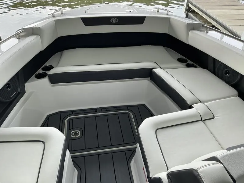 Slide: The Image of 2025 Cobalt R31 boat interior with sleek seating and modern design. - 46