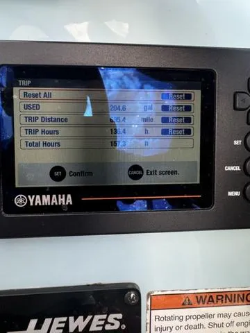Slide: The Image of Yamaha display showing trip data on a 2020 Hewes Redfisher 18 boat. - 3