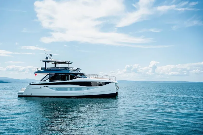 Slide: The Image of Luxury Prestige M7 yacht cruising on a serene ocean, 2025 model. - 20