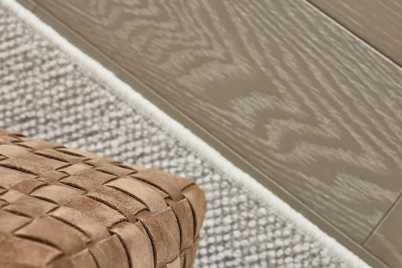 Slide: The Image of Woven leather texture on carpet and wood floor, Prestige M7, 2025 model. - 32