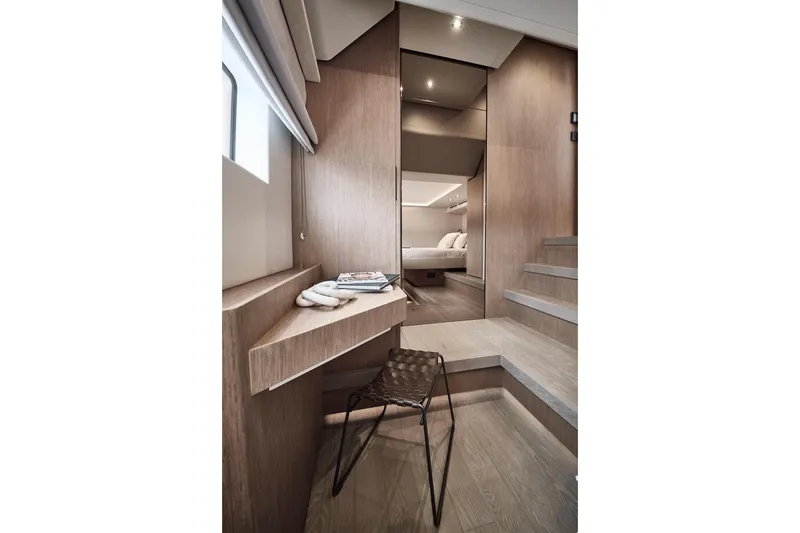 Slide: The Image of Luxurious interior of 2025 Prestige M7 yacht with modern design and elegant furnishings. - 44