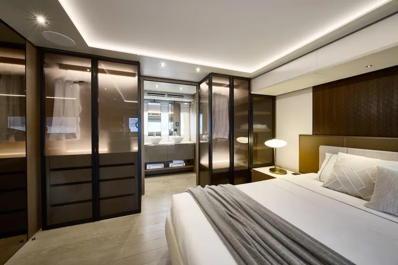 Slide: The Image of Luxurious Prestige M7 2025 yacht bedroom with modern design and ambient lighting. - 28