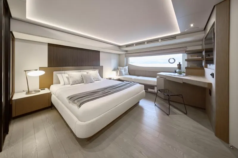 Slide: The Image of Luxurious bedroom interior of Prestige M7 yacht, 2025 model, featuring modern design and elegant furnishings. - 35