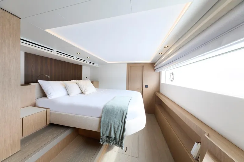 Slide: The Image of Luxurious Prestige M7 2025 yacht bedroom with modern design and elegant lighting. - 37