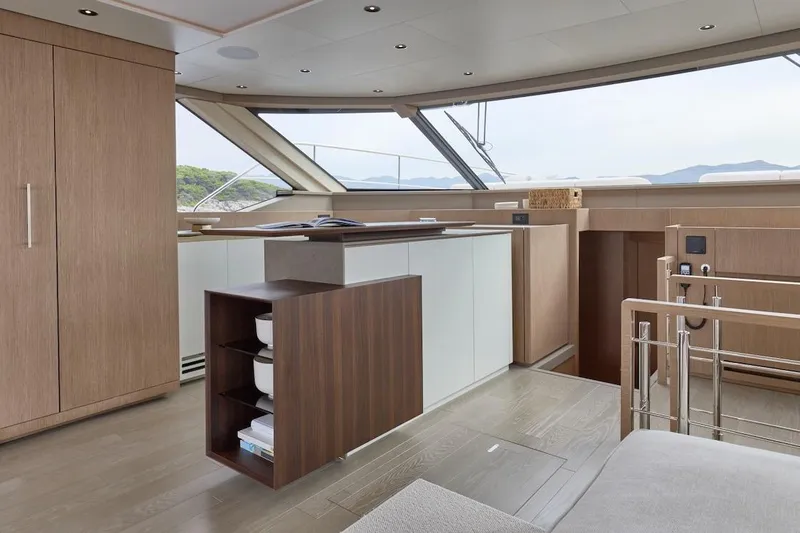 Slide: The Image of Luxurious interior of 2025 Prestige M7 yacht with modern wood finishes and panoramic windows. - 73