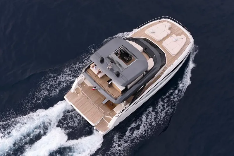 Slide: The Image of Aerial view of 2025 Prestige M7 yacht cruising on open water. - 86