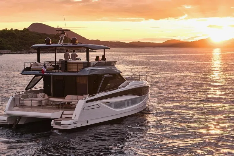Slide: The Image of Luxury Prestige M7 yacht cruising at sunset, 2025 model. - 94