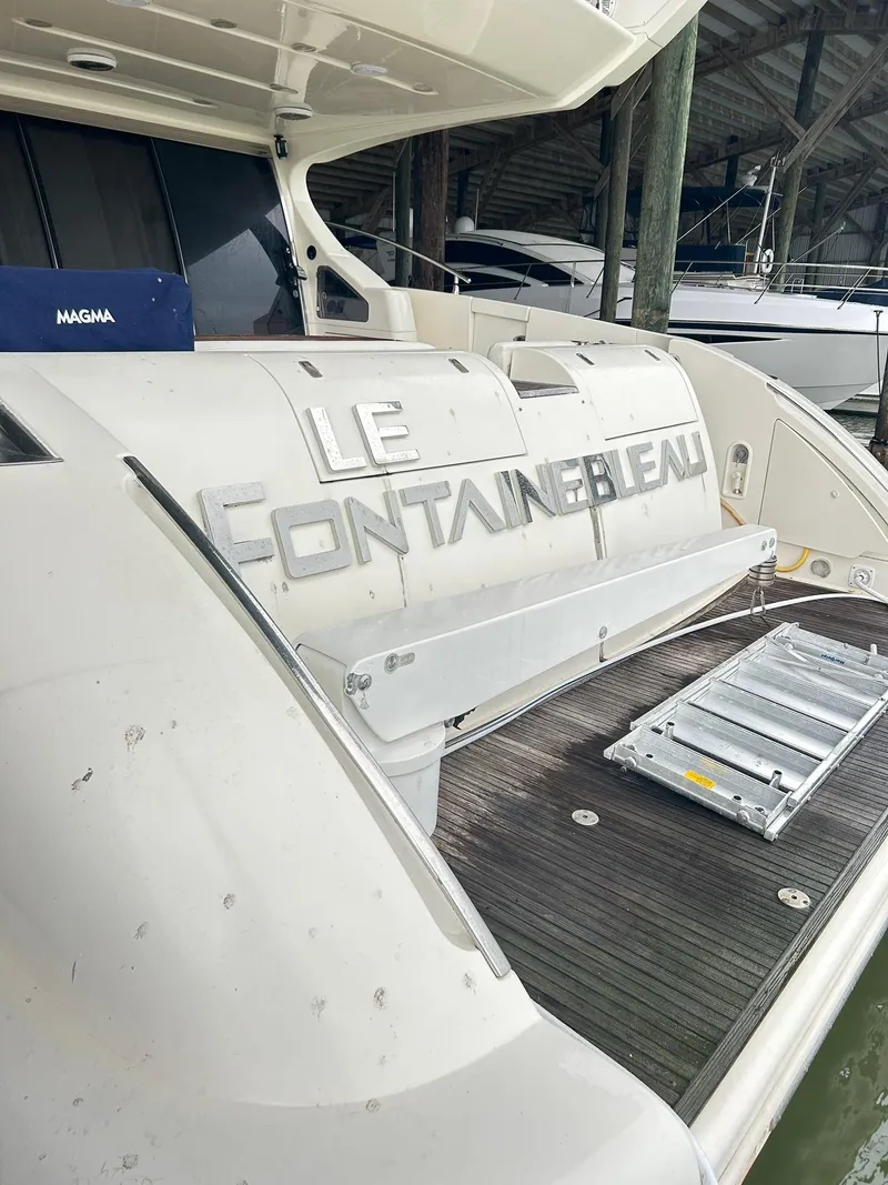 Slide: The Image of 2006 Azimut 62 yacht stern view with "Le Fontainebleau" nameplate. - 28