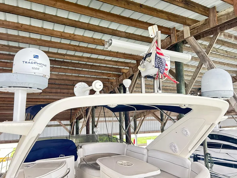 Slide: The Image of 2006 Azimut 62 yacht under shelter with radar and American flag. - 40