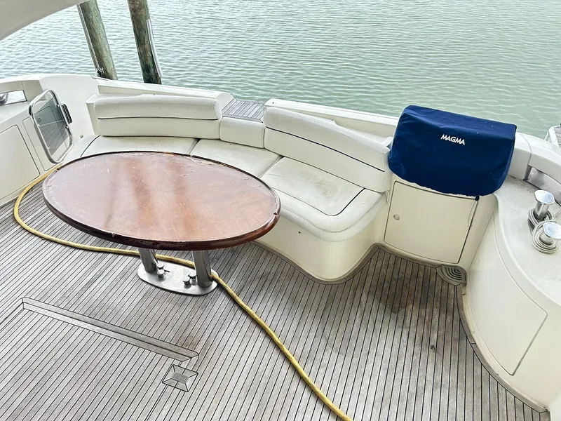 Slide: The Image of Luxury Azimut 62 yacht deck with seating and table, 2006 model. - 41