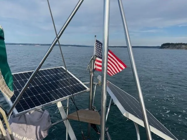 Slide: The Image of 1985 Bristol Channel Cutter 28 docked at night, illuminated by soft lighting. - 5