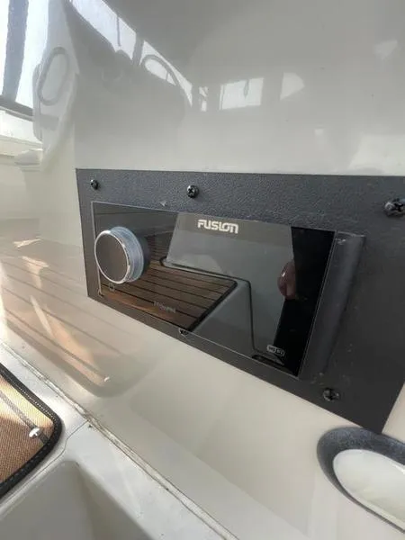 Slide: The Image of Fusion stereo system installed on a 1997 Carver 400 CPMY yacht dashboard. - 32