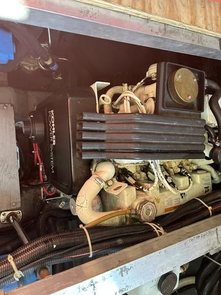 Slide: The Image of Engine compartment of a 1997 Carver 400 CPMY with Kohler power system. - 47