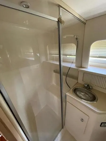Slide: The Image of Bathroom interior of 1997 Carver 400 CPMY yacht with shower and sink. - 8