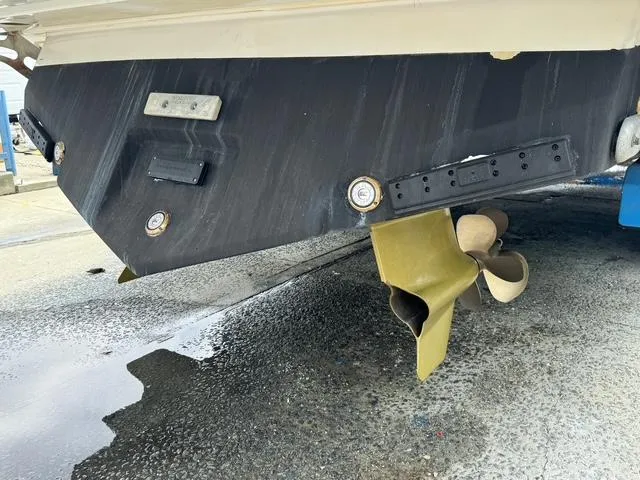 Slide: The Image of 2013 Formula 40pc boat stern with propeller and rudder on dry dock. - 15