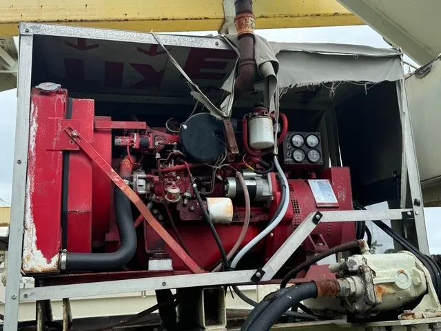 Slide: The Image of Red industrial generator, Formula 40pc, 2013 model, with visible gauges and pipes. - 16