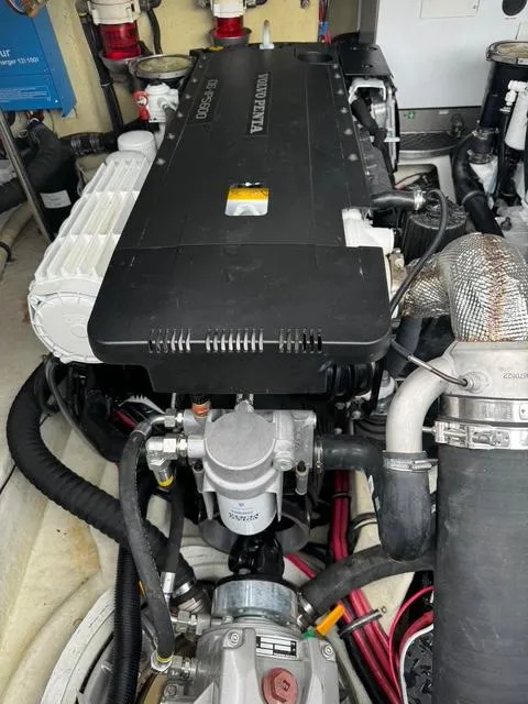 Slide: The Image of Engine compartment of a 2013 Formula 40pc boat, showcasing detailed mechanical components. - 18
