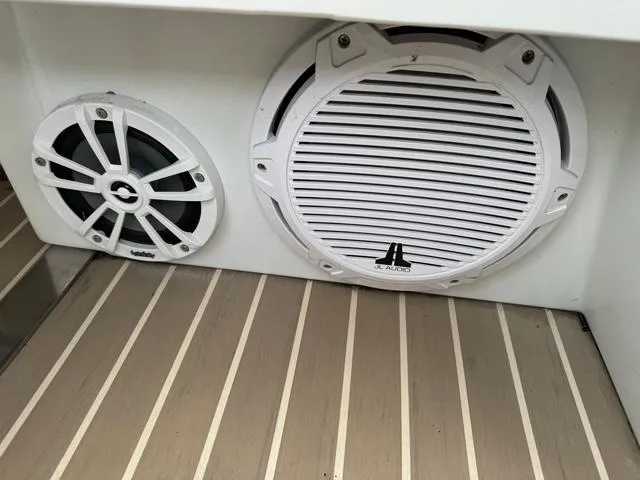Slide: The Image of White marine speakers on a 2013 Formula 40pc boat deck. - 23
