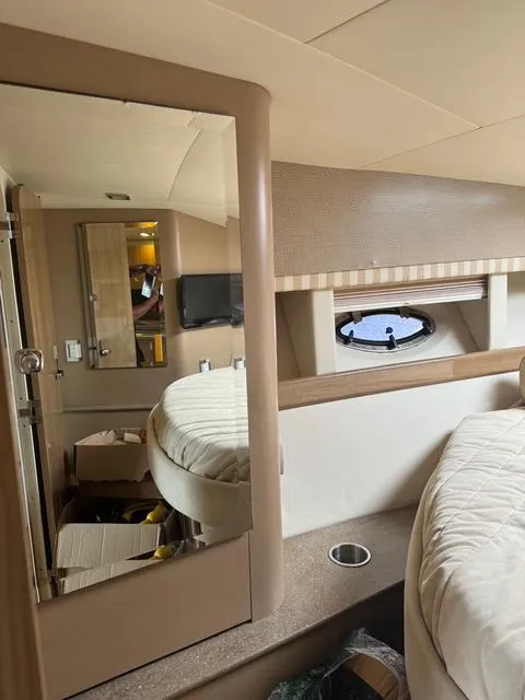 Slide: The Image of Interior of 2013 Formula 40pc yacht with cozy bedroom and porthole window. - 29