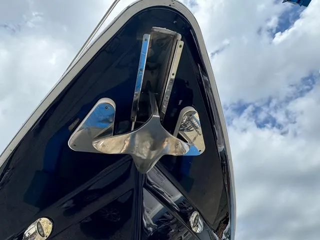 Slide: The Image of Bow view of a 2013 Formula 40pc yacht against a cloudy sky. - 6