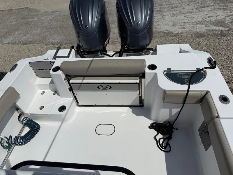Slide: The Image of 2021 Sportsman Open 282 boat deck with dual engines and seating area. - 12