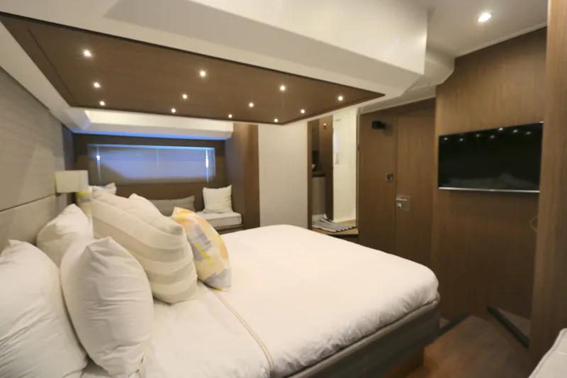 Slide: The Image of Luxurious bedroom interior of 2019 Beneteau Gran Turismo 50 yacht with modern amenities. - 8