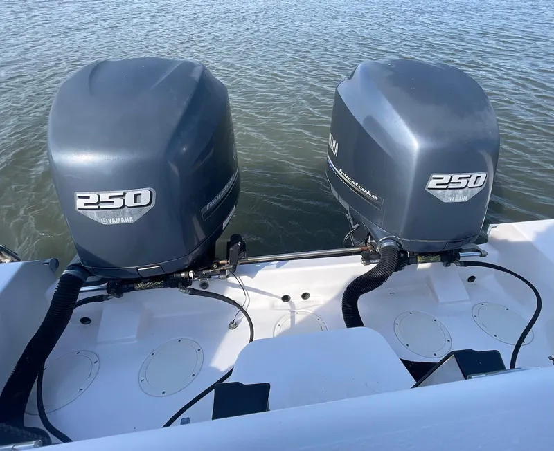 Slide: The Image of Twin Yamaha 250 outboard engines on a 2002 Grady-White Express 330 boat. - 16