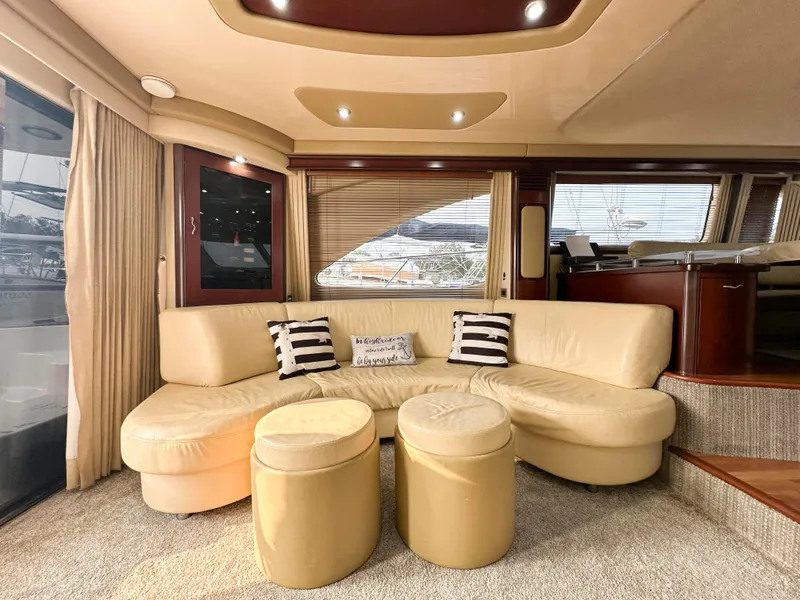 Slide: The Image of Luxurious interior of 2006 Sea Ray 58 Sedan Bridge yacht with plush seating. - 21