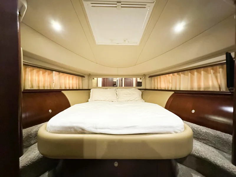 Slide: The Image of Luxurious bedroom interior of 2006 Sea Ray 58 Sedan Bridge yacht. - 34