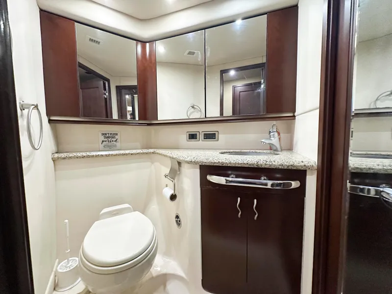 Slide: The Image of Luxurious bathroom in 2006 Sea Ray 58 Sedan Bridge yacht with modern fixtures. - 39