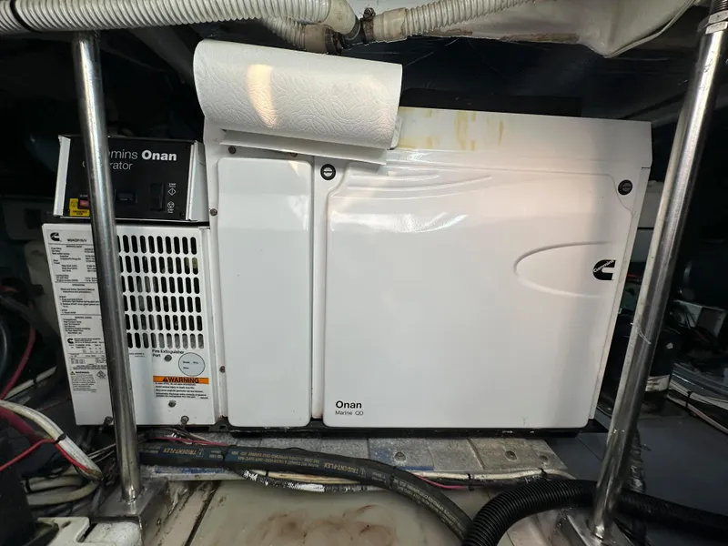 Slide: The Image of Cummins Onan generator in a 2006 Sea Ray 58 Sedan Bridge engine room. - 46