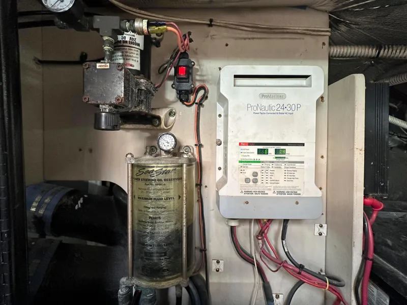 Slide: The Image of Engine room of 2006 Sea Ray 58 Sedan Bridge with ProNautic charger and fuel filter system. - 47