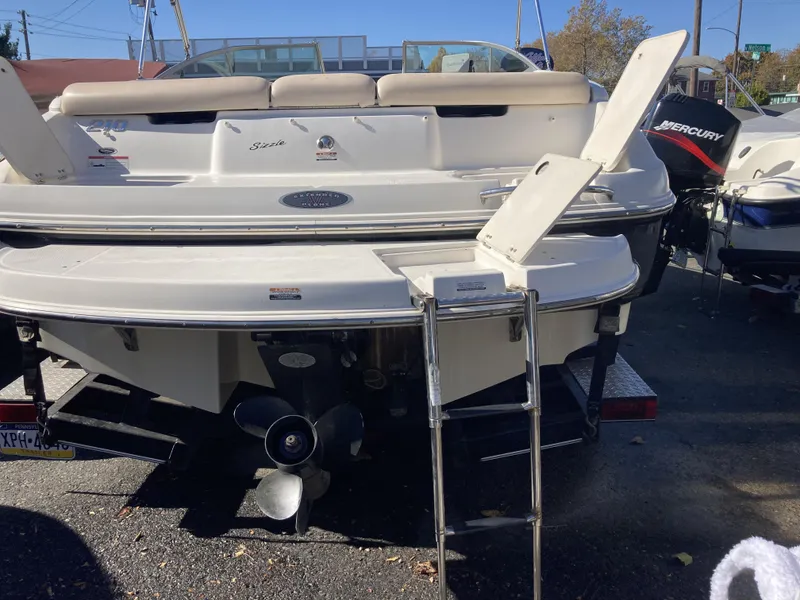 Slide: The Image of 2008 Chaparral 210 SSi boat rear view with swim platform and ladder. - 10