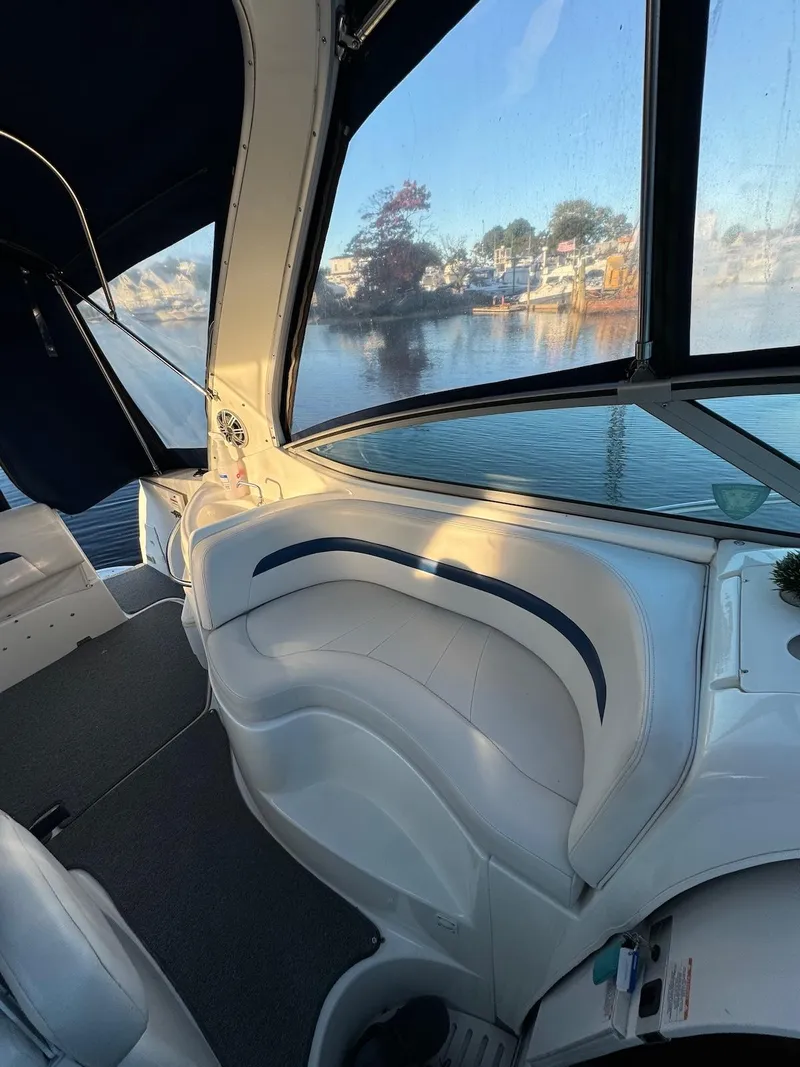 Slide: The Image of 2003 Chaparral Signature 280 boat interior with lake view through windows. - 5