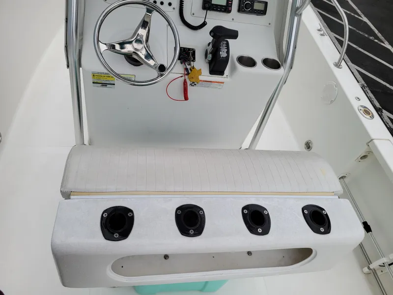 Slide: The Image of 2006 Sea Pro 196 Center Console boat dashboard with steering wheel and controls. - 10