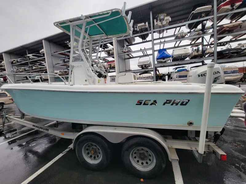 Slide: The Image of 2006 Sea Pro 196 Center Console boat on trailer in storage facility. - 5