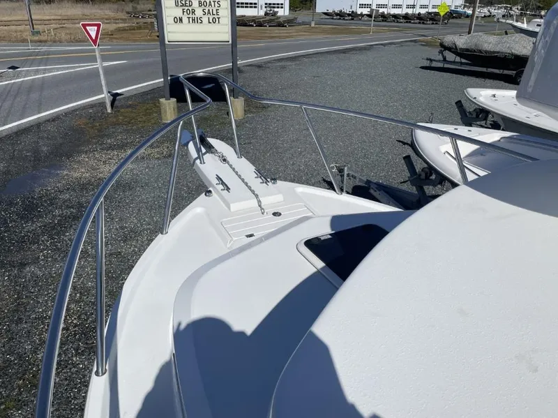 Slide: The Image of Bow of a 2022 Parker 2120 boat for sale in a lot. - 14