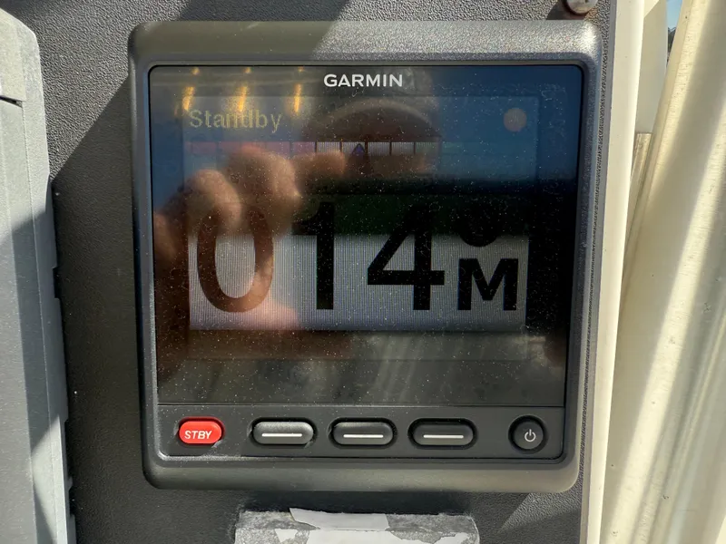 Slide: The Image of Garmin marine display on 2007 Wellcraft 352 Tournament boat showing 14 meters. - 18