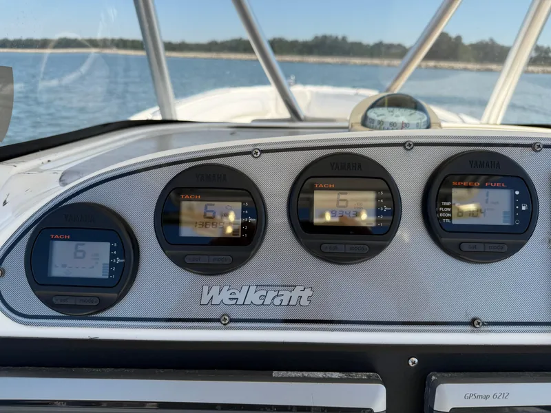 Slide: The Image of Dashboard of a 2007 Wellcraft 352 Tournament boat with Yamaha gauges. - 19