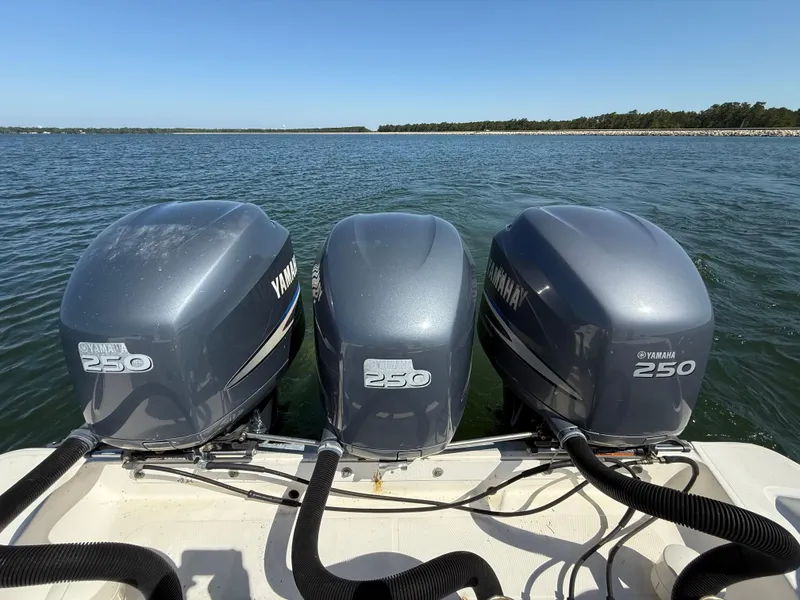 Slide: The Image of Triple Yamaha 250 outboard engines on a 2007 Wellcraft 352 Tournament boat. - 23