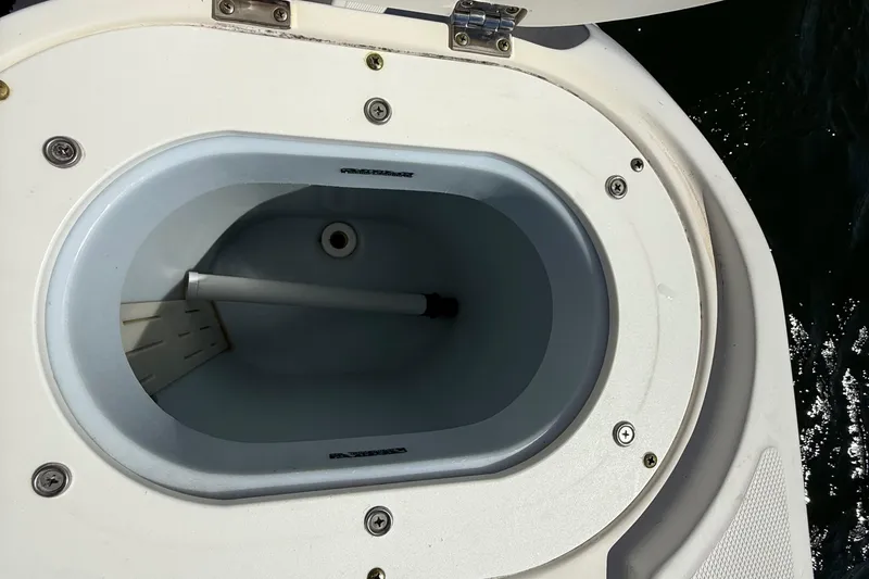 Slide: The Image of Livewell compartment on a 2007 Wellcraft 352 Tournament boat, open and empty. - 28
