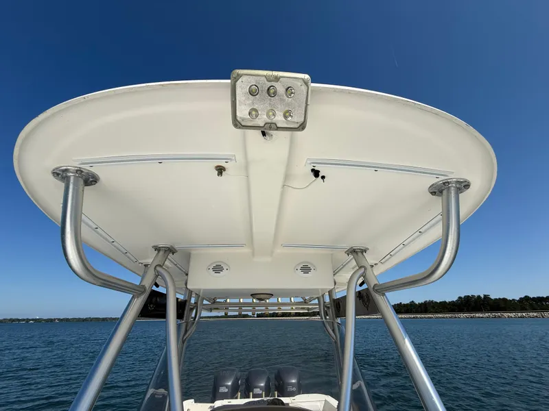 Slide: The Image of 2007 Wellcraft 352 Tournament boat canopy with ocean backdrop. - 34
