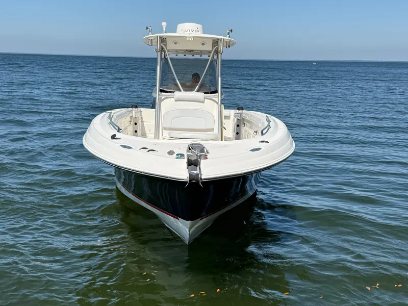 Slide: The Image of 2007 Wellcraft 352 Tournament boat on calm water, front view. - 4