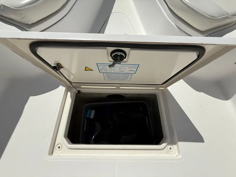 Slide: The Image of Open storage compartment on 2007 Wellcraft 352 Tournament boat deck. - 48