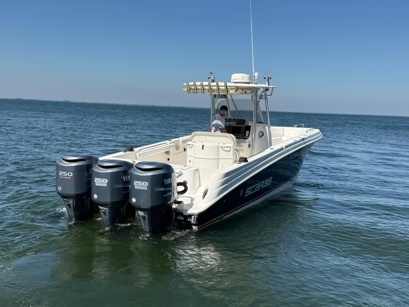 Slide: The Image of 2007 Wellcraft 352 Tournament boat with triple Yamaha 250 engines on open water. - 5