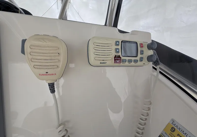 Slide: The Image of 2008 Pursuit C 250 Center Console boat radio and communication equipment. - 11