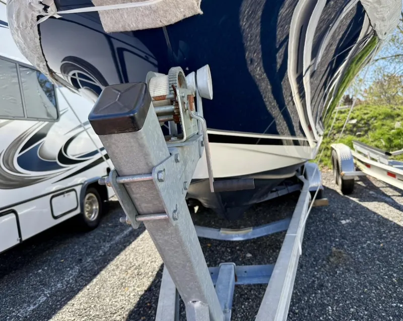 Slide: The Image of 2008 Pursuit C 250 Center Console boat on trailer, close-up view. - 30