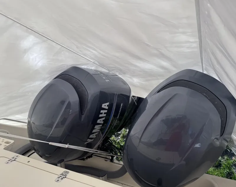 Slide: The Image of Twin Yamaha outboard engines on a 2008 Pursuit C 250 Center Console boat. - 4